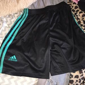 Black and blue adidas shorts